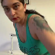 A mature, European woman speaks to the camera (In English), then takes a piss while standing and a solid shit while sitting on a makeshift potty chair. She shows us her dirty asshole before a closer look at her poop pile on the floor. About 9.5 minutes.